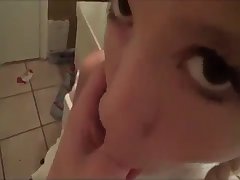 Pigtailed teen sucks her brother's dick